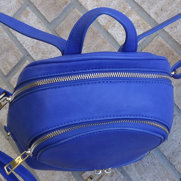 Mini backpack purse with gold tone zippers. main image 12